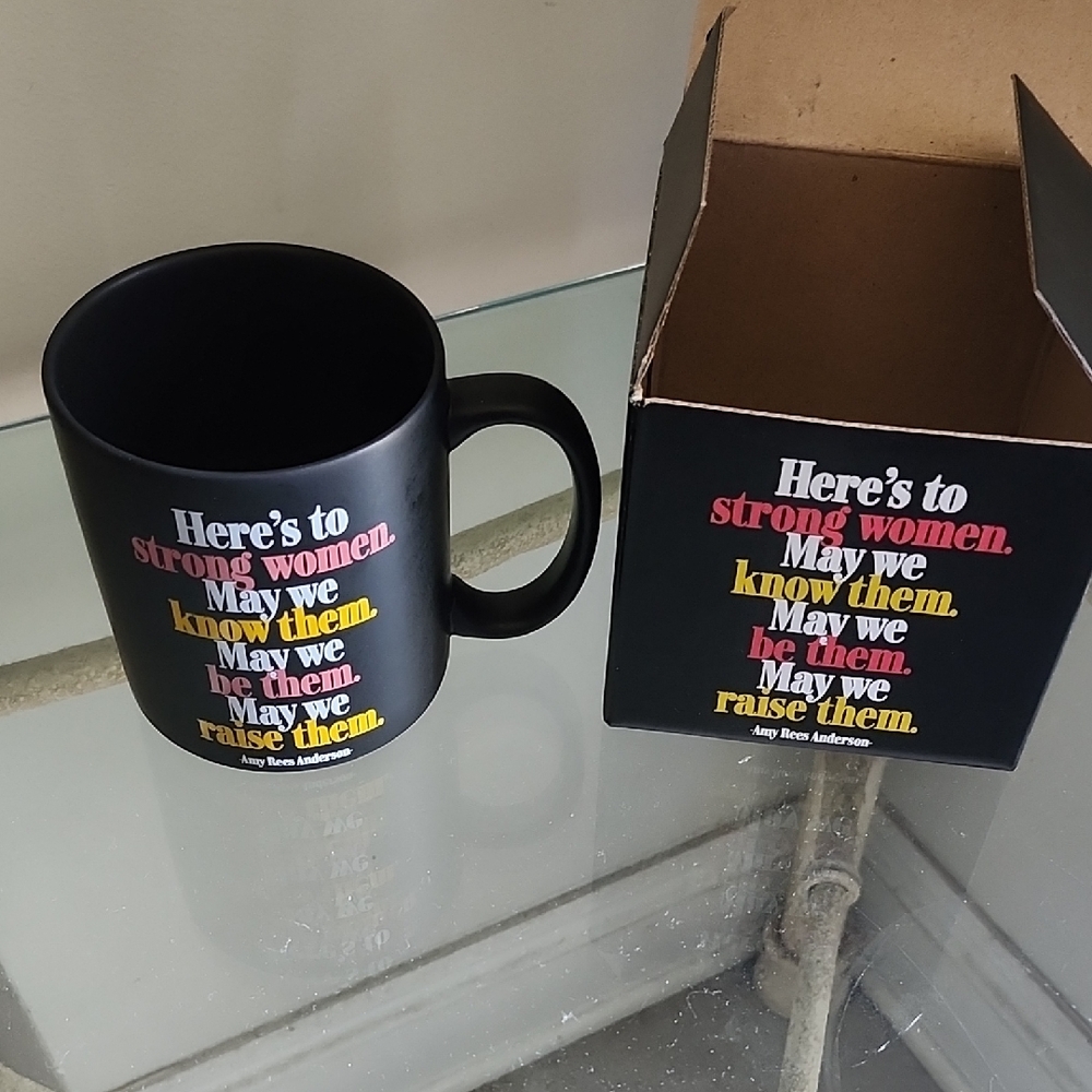 Glossy Black Ceramic Mug with Vibrant Typography